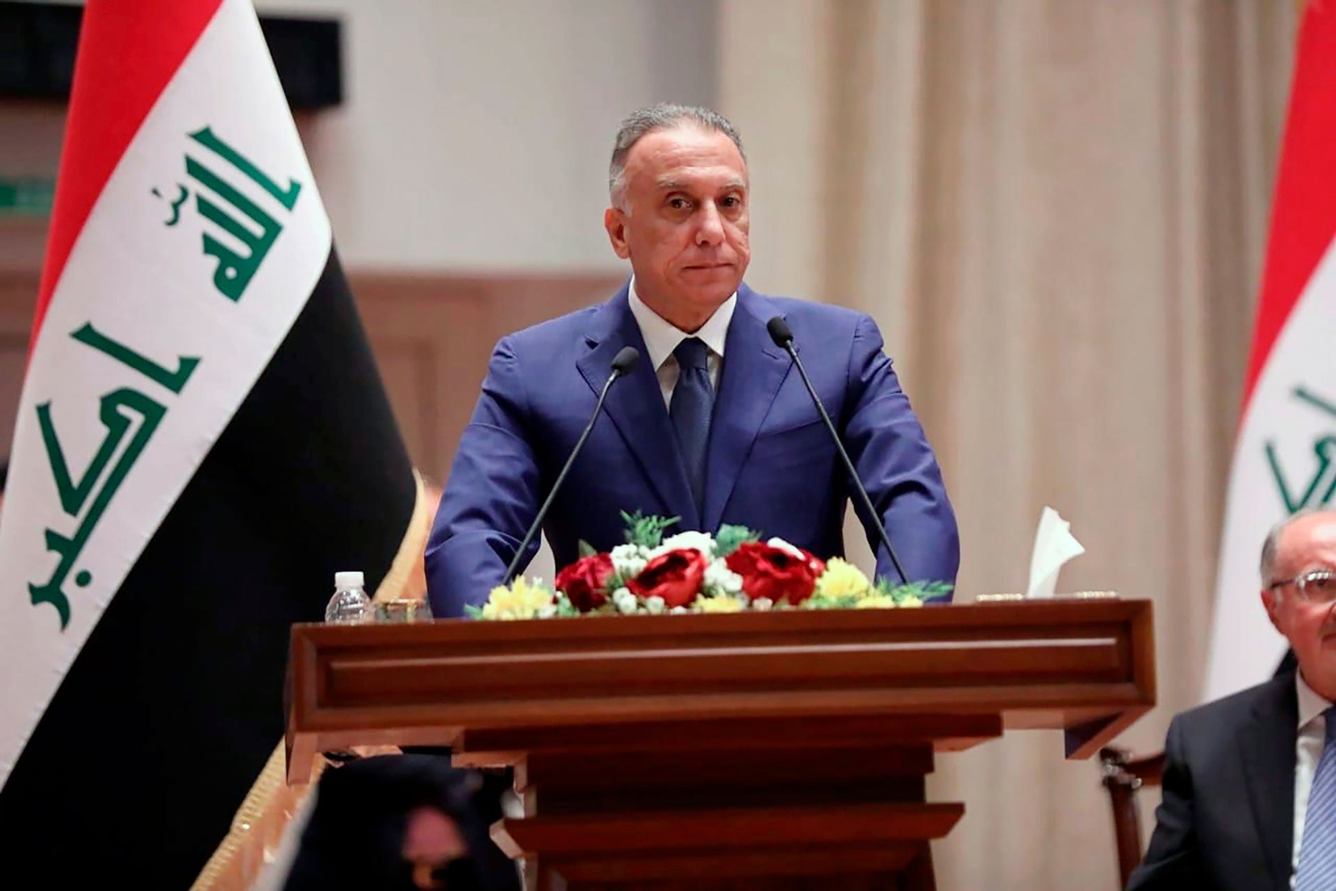 Iraqi Prime Minister Mustafa al-Kadhimi speaks to members of the Iraqi parliament in Baghdad, Iraq, May 7, 2020.