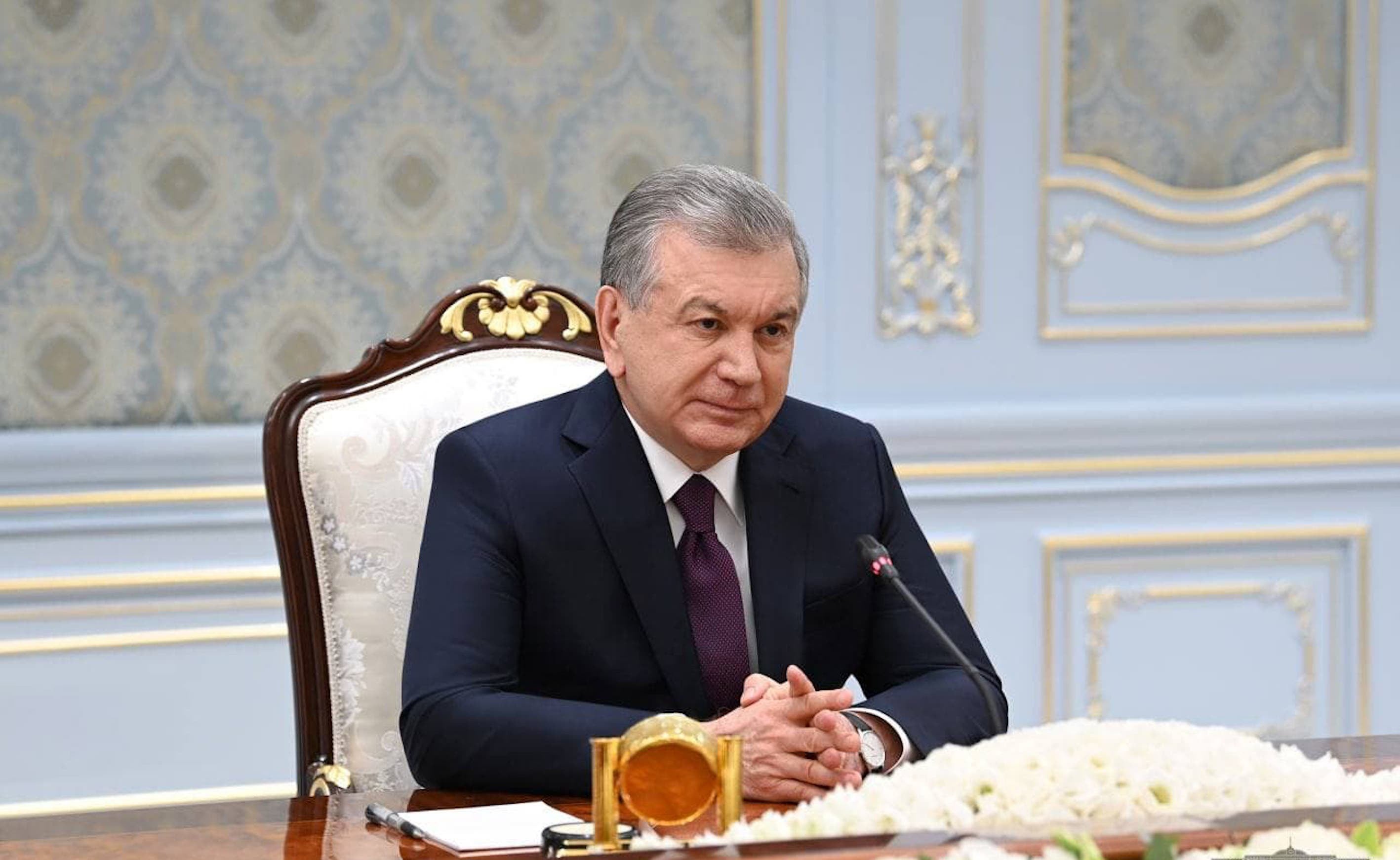 Uzbek President Shavkat Mirziyoyev receives Iranian Foreign Minister Mohammad Javad Zarif (not pictured) in Tashkent.