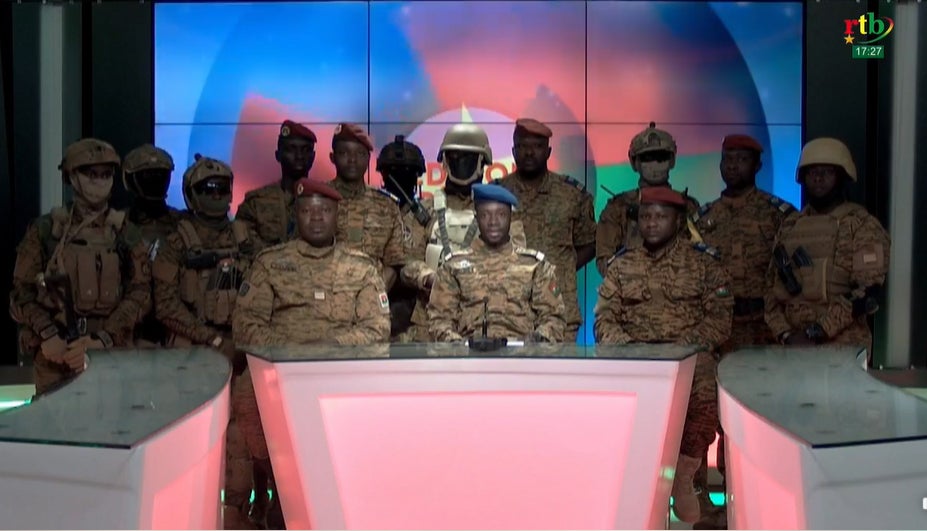 A screen grab shows Capt. Kader Ouedraogo confirming the military coup on state television in Ouagadougou, Burkina Faso on January 24, 2022. 