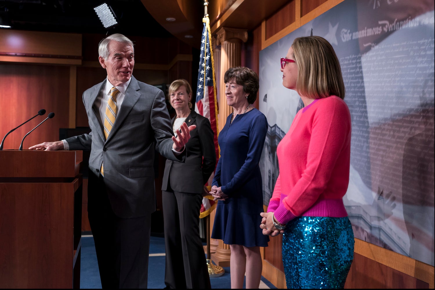 Senators talk with reporters following Senate passage of Respect for Marriage Act. 