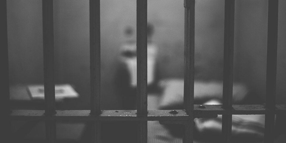 A photo of a prison cell.