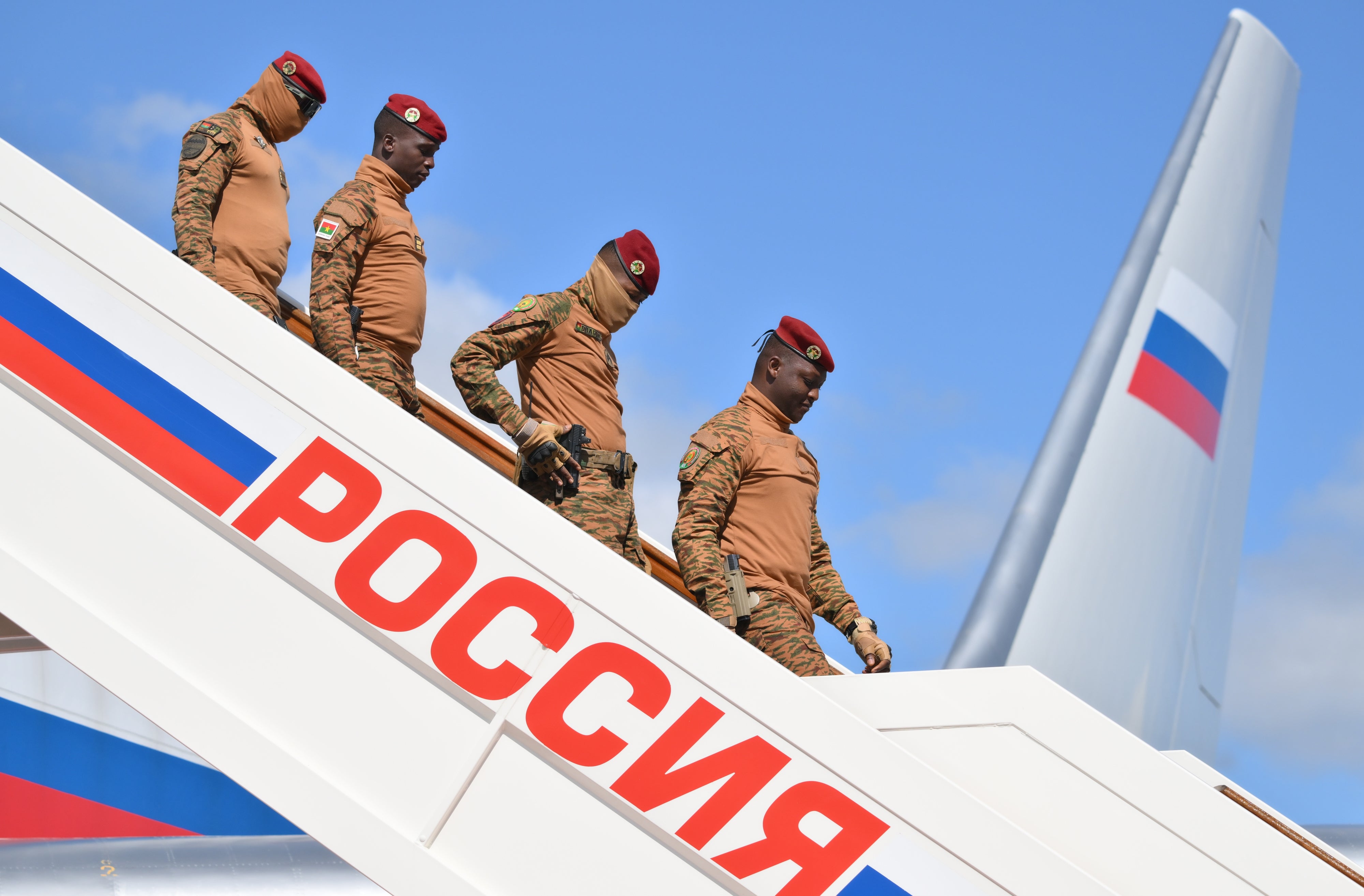 Burkina Faso president gets off plane at Moscow airport.