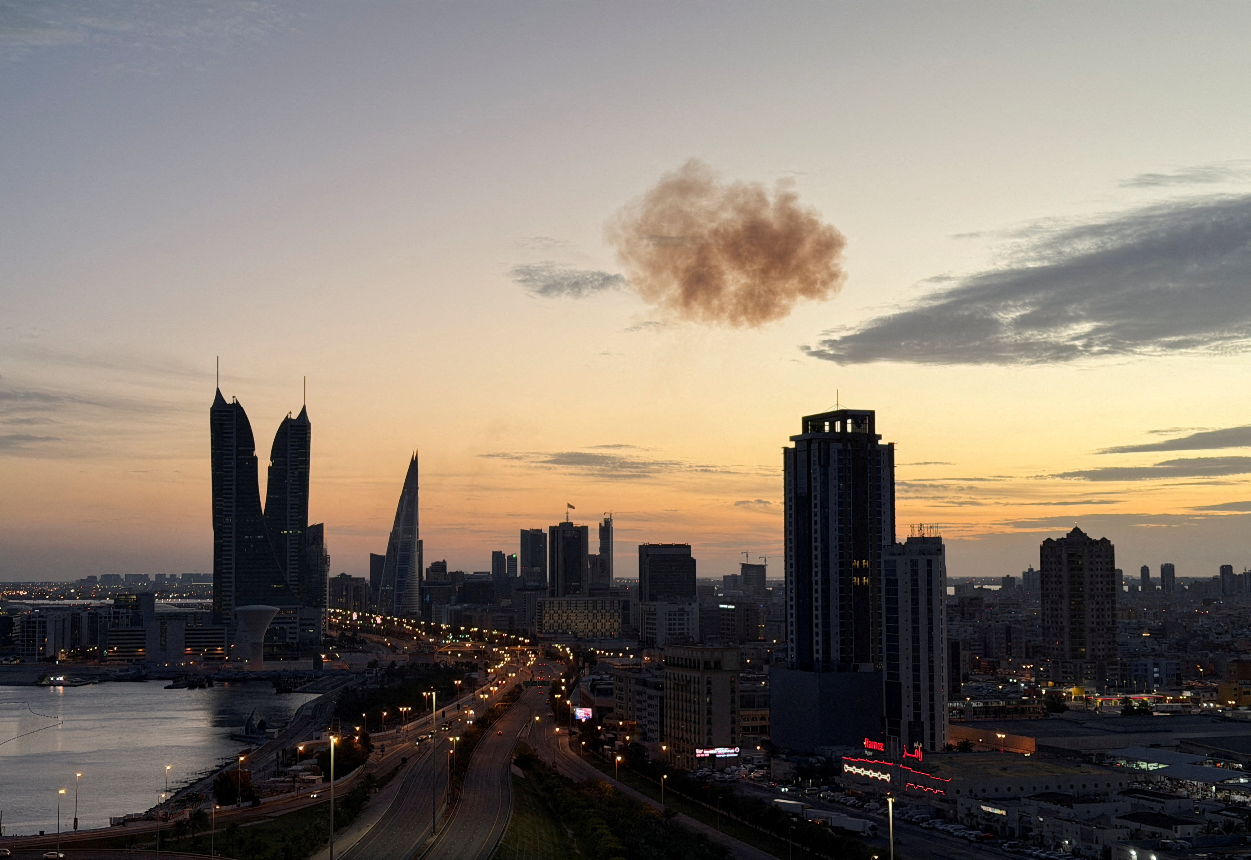 Smoke rises after an Iranian drone was intercepted over the Bahrain Financial Harbour towers, which houses the Israeli embassy, amid the US-Israel conflict with Iran, in Manama, Bahrain, March 6, 2026.