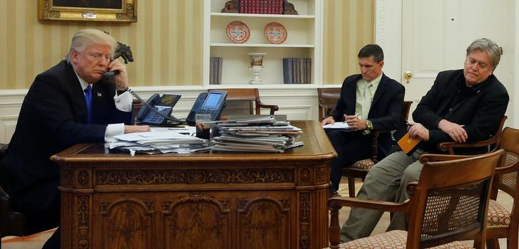 US President Donald Trump speaks by phone with Australia’s Prime Minister Malcolm Turnbull at the White House in Washington, DC, on January 28, 2017. 