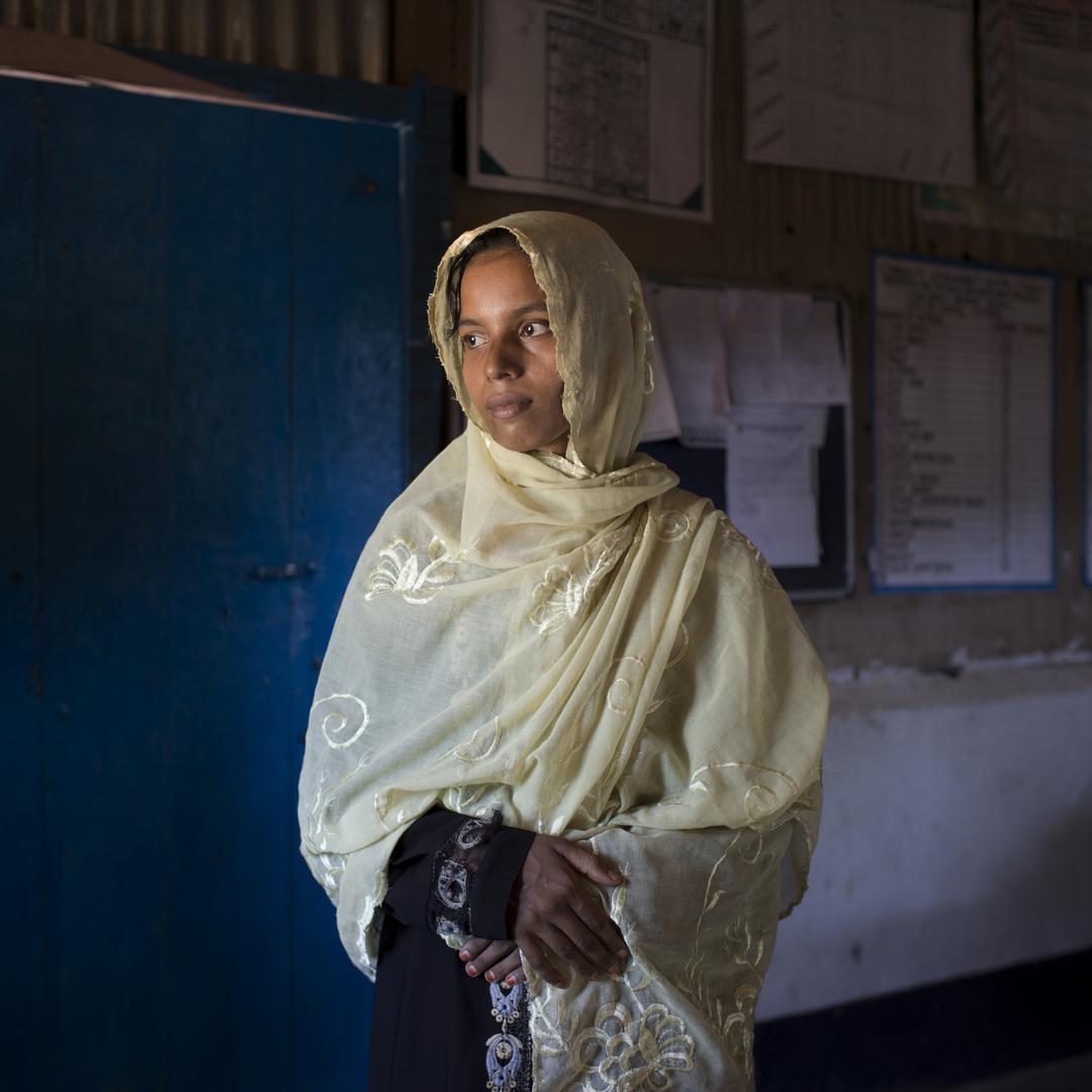 Hasina witnessed a massacre. Burmese army soldiers threw her infant into a fire. Her younger siblings were beaten to death. The soldiers attempted to rape her before leaving her for dead in a burning house. Kutupalong refugee camp, Bangladesh, September 2