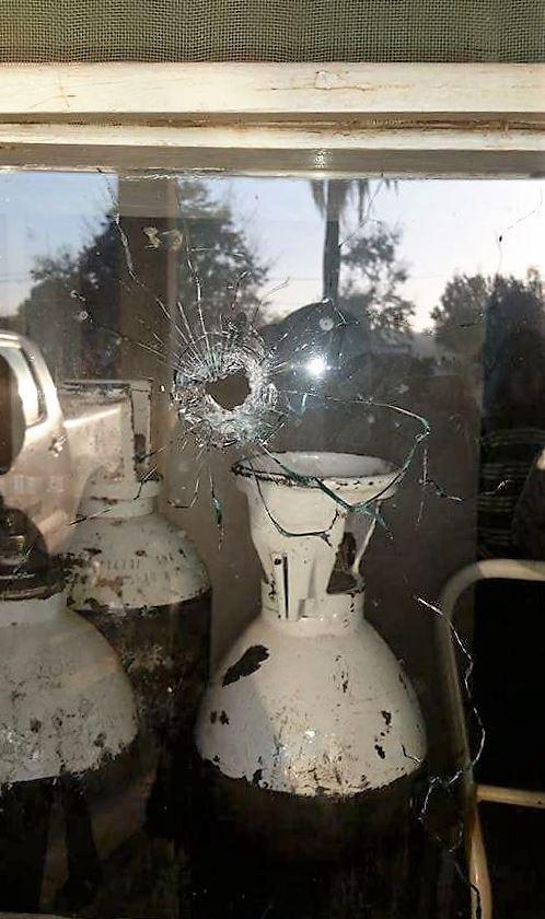A bullet hole in the window of Morrumbala District Hospital after a raid by Renamo gunmen on August 12, 2016.  