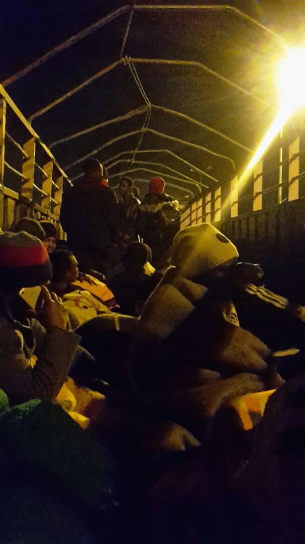 Migrants on a truck, leaving the camp in Tamanrasset on February 13, 2018.