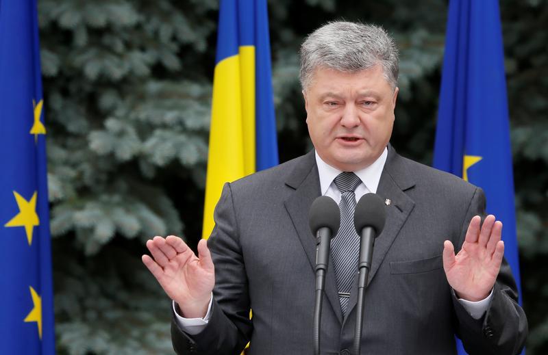 Ukrainian President Petro Poroshenko speaks during a joint news conference with European Council President Donald Tusk and European Commission President Jean-Claude Juncker following the EU-Ukraine summit in Kiev, Ukraine, July 13, 2017.