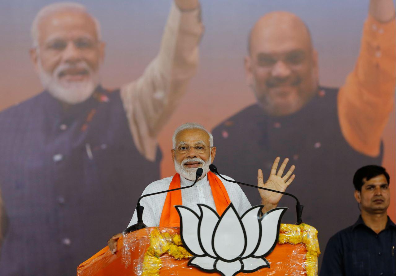 भारत के अहमदाबाद में एक रैली को संबोधित करते प्रधानमंत्री नरेंद्र मोदी. 26 मई, 2019 © 2019 एपी फ़ोटो/अजित सोलंकी
