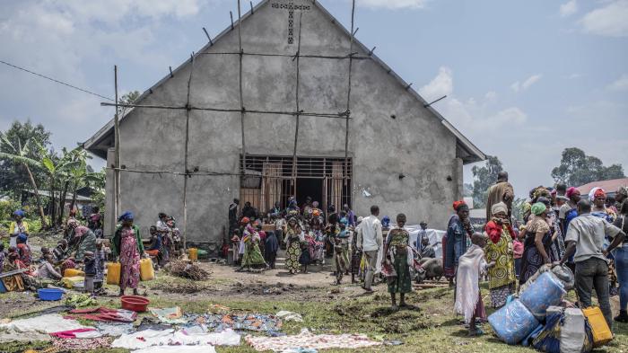 Civilians flee fighting between M23 rebels near Kivu.