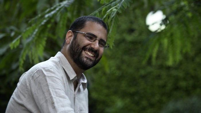 A man smiling in a photo