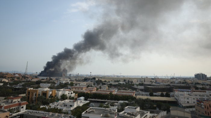Smoke rises after Iran launched a missile attack targeting the headquarters of the US Navy Base in Manama, Bahrain about 3 mi/5 km away from Dry Dock Prison, February 28, 2026. 