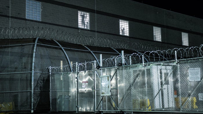 The silhouettes of detainees being held at Delaney Hall during a protest on May 30, 2026, in Newark, New Jersey.