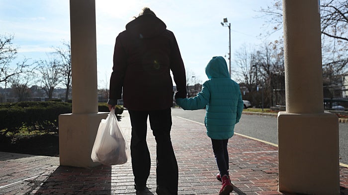 A woman and her daughter in Revere, Massachusetts, US, December 11, 2020.