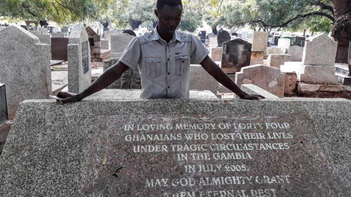 Massacre survivor Martin Kyere at Accra cemetery where six bodies were returned from Gambia. 
