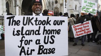 Rosemond Sameenaden joins other Chagos islanders outside the High Court, London, where they are fighting the UK government for the reinstatement of their homeland. 