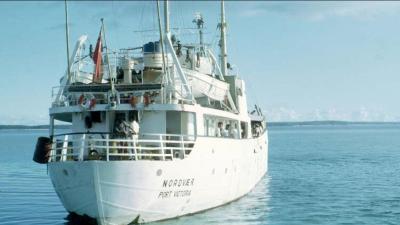 An archival photo of a boat at sea
