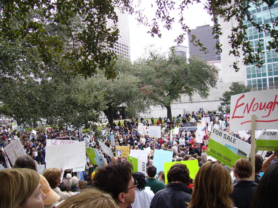 People protest in front of the storm damaged city hall in New Orleans, Louisiana, over the city’s response to Hurricane Katrina, 2006.