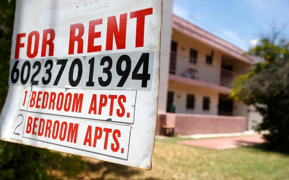 A rental sign is posted in front of an apartment complex in Phoenix, Arizona, July 14, 2020. 