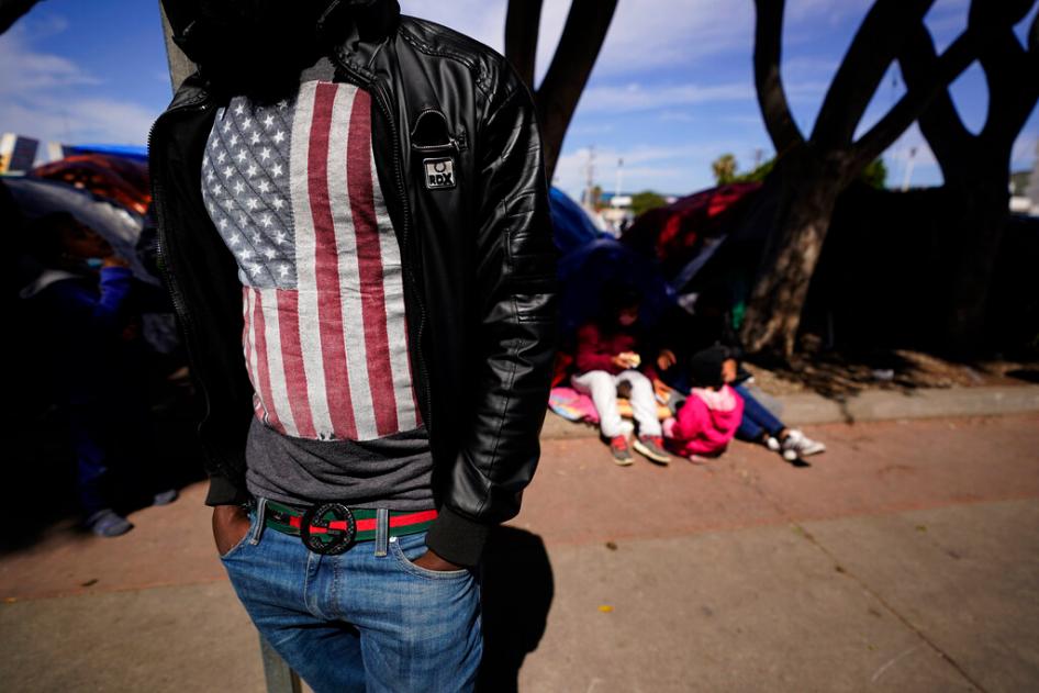  asylum seeker from Haiti waits at a makeshift encampment at the border port of entry