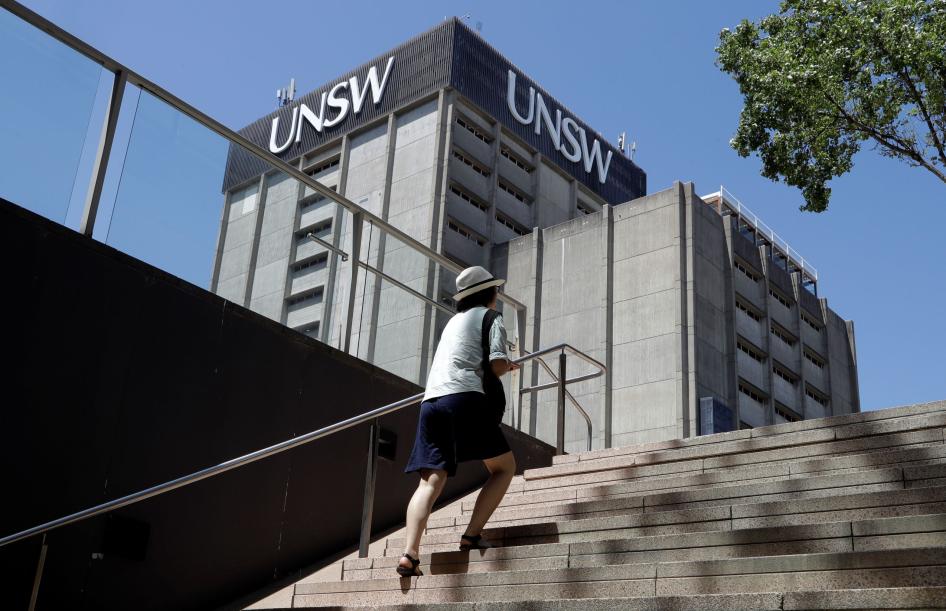 A student walks around the University of New South Wales campus in Sydney, Australia, December 1, 2020.