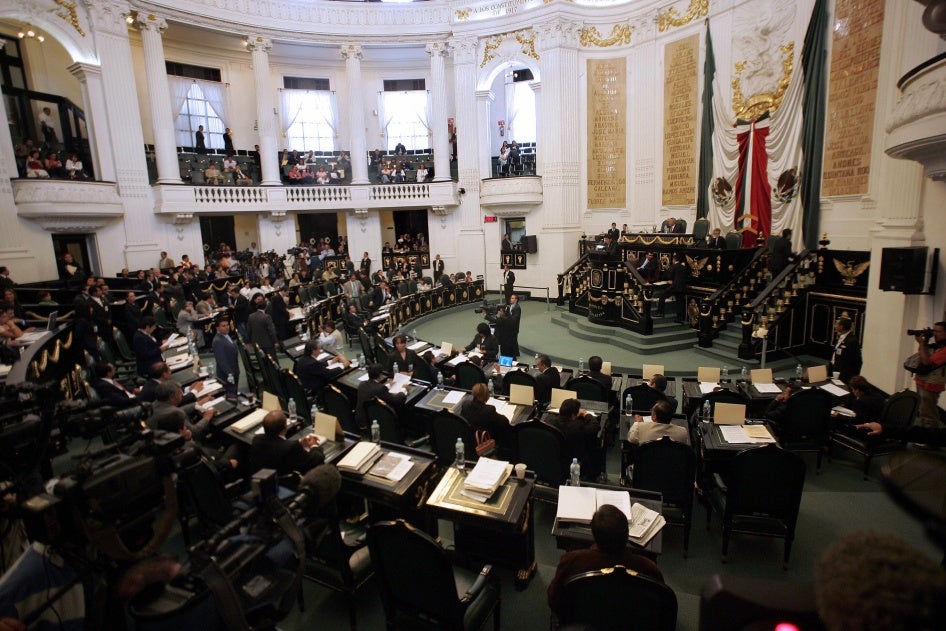 Legislators attend a session of Mexico City’s Congress 