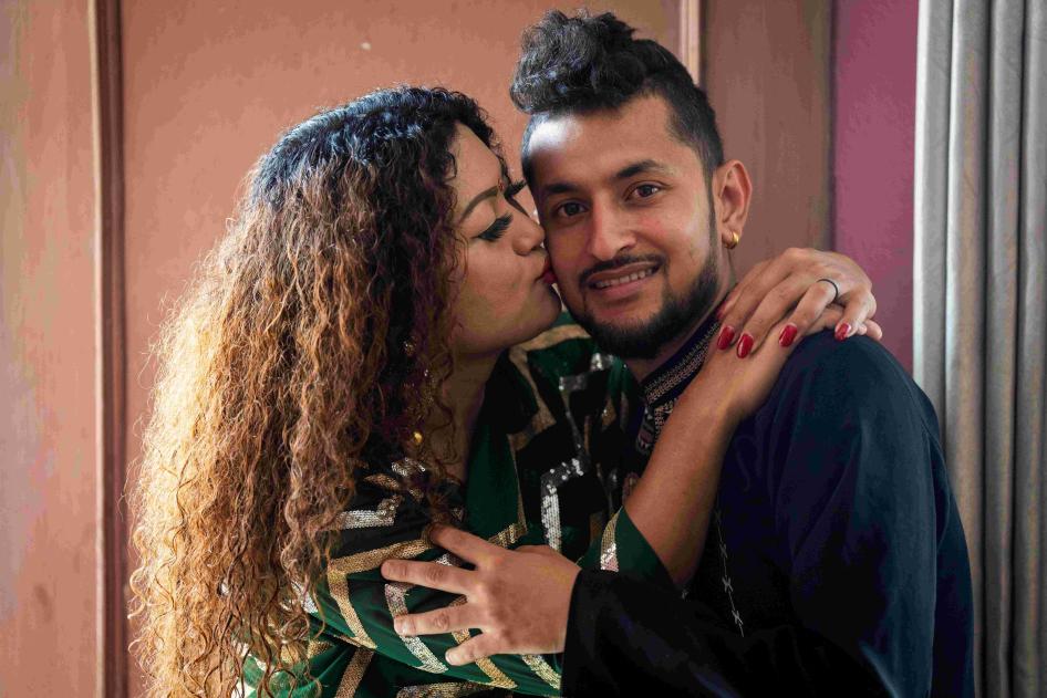 Surendra Pandey, right, and Maya Gurung, who married six years ago, pose for a photograph 