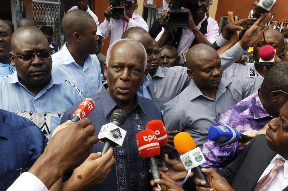 Angola's President José Eduardo dos Santos gives an interview to the media