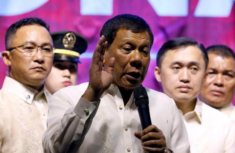 Philippine President Rodrigo Duterte speaks to protesters after he delivered his State of the Nation address at the Congress in Quezon city, Metro Manila Philippines July 24, 2017.