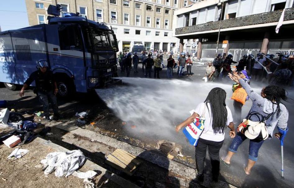 refugees water cannons