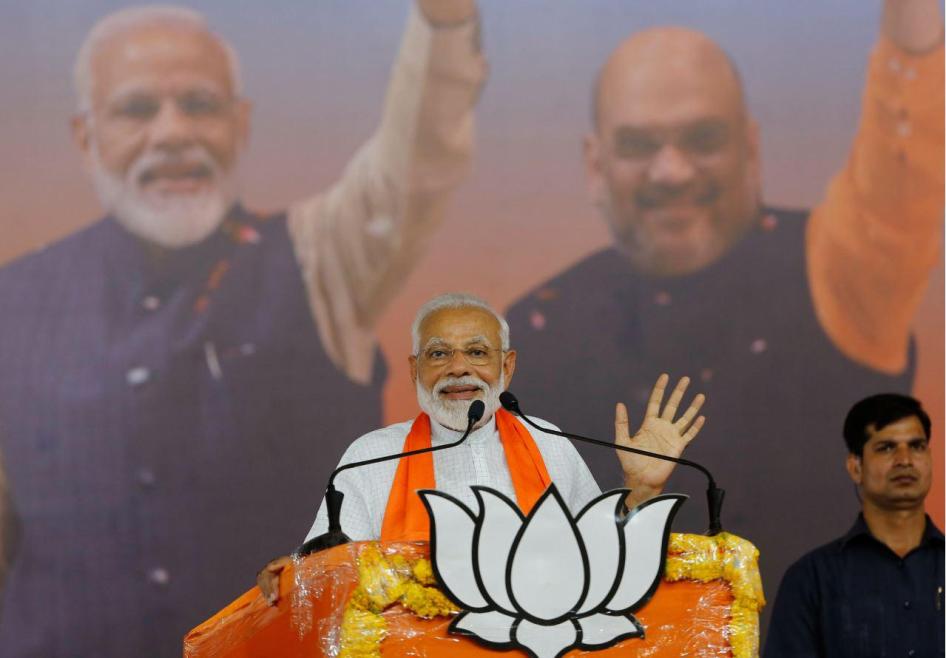 भारत के अहमदाबाद में एक रैली को संबोधित करते प्रधानमंत्री नरेंद्र मोदी. 26 मई, 2019 © 2019 एपी फ़ोटो/अजित सोलंकी