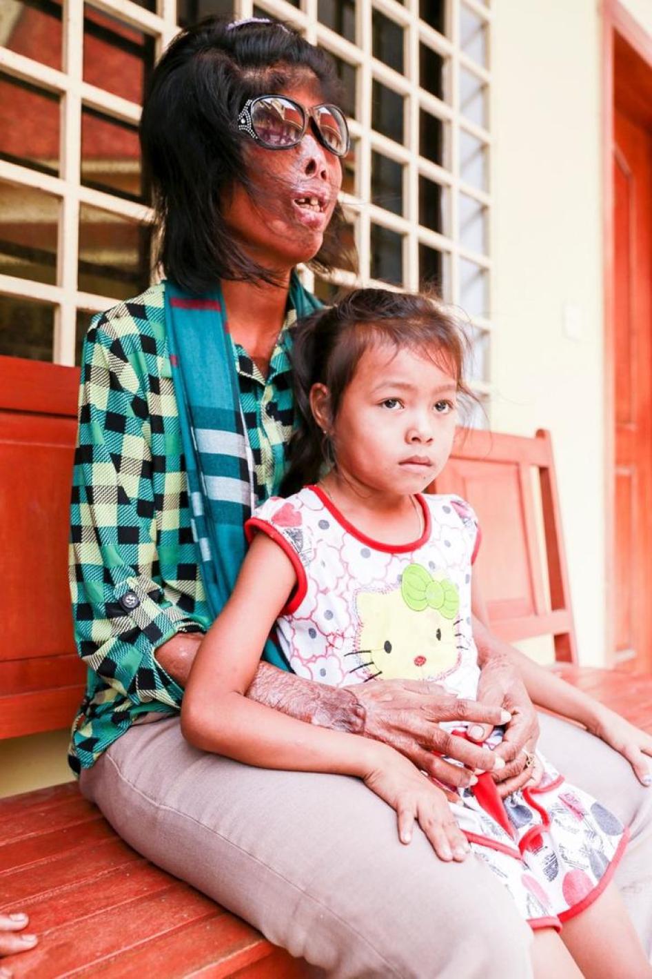 Kong Touch awaits a verdict outside the Cambodia Supreme Court on July 22, 2015. 