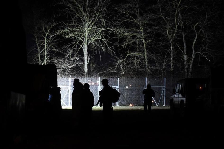 Greek soldiers guard the Kastanies border gate at the Greek-Turkish border, February 29, 2020.