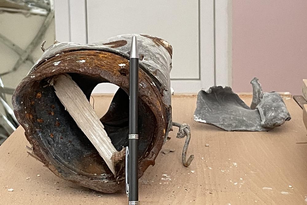 A pen shows the scale of a grad remnant