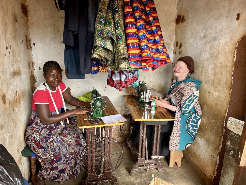 Chinsisi Gama (right), 30, from Dowa, Malawi. 