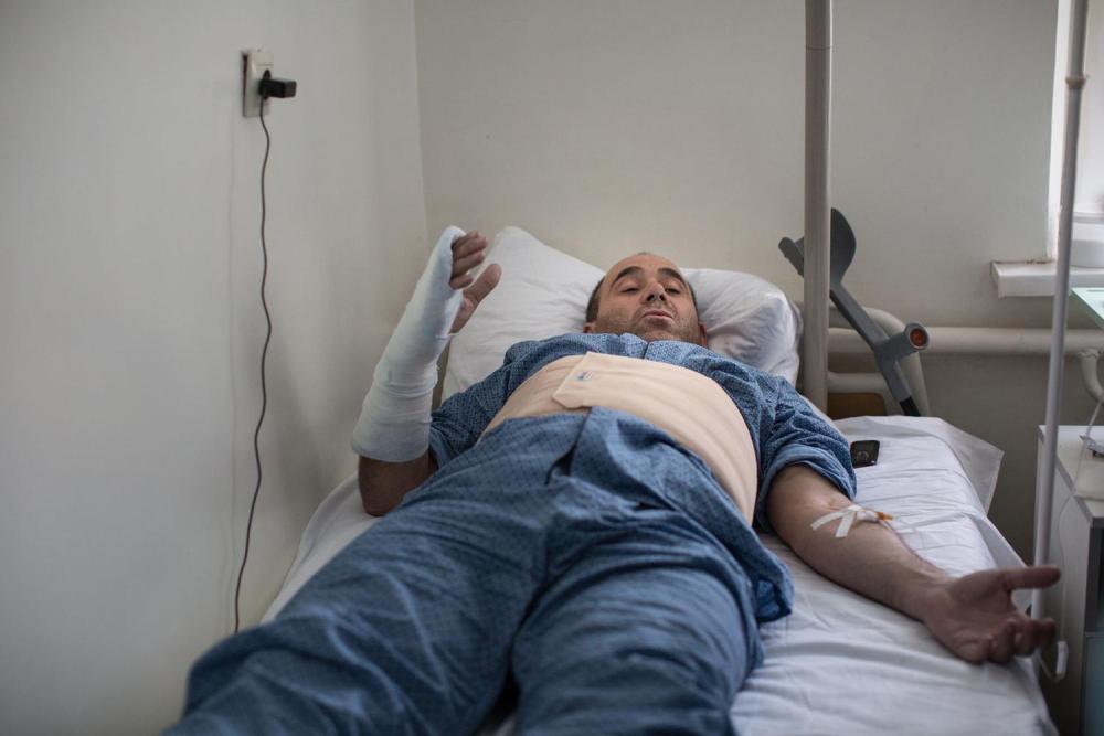 Severely injured bus driver, Bashir Pliev, in hospital in Ingushetia after the attack on a bus with Russian and foreign journalists on a work trip to Chechnya in March close to administrative border between Ingushetia and Chechnya. 