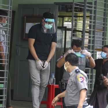 Pastor David Lah leaves court after an appearance on charges filed against him for holding religious services in April, Yangon, Myanmar, May 20, 2020.