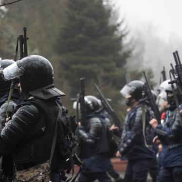 Riot police officers holding 12-gauge shotguns, which can fire both lethal and less-lethal ammunition, in Almaty, Kazakhstan, on Wednesday, Jan. 5, 2022.