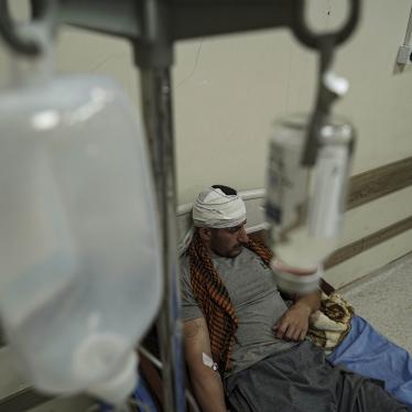 A member of an Iranian opposition party based in the Kurdistan Region of Iraq lies injured on a hospital bed following Iranian air attacks, September 28, 2022.