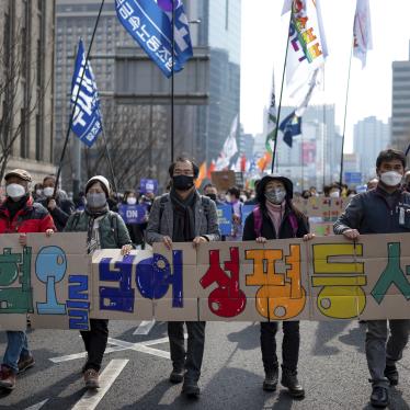 Civil society organizations and activists march in a rally for International Women's Day