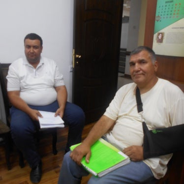 Javokhir Muminov (left) and Djura Akbarov (right) at the Kashkadarya Regional Prosecutor's Office. 