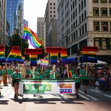 Marchers with the Greater Seattle Business Association, Washington State's LGBTQ+ and allied chamber of commerce, during the annual Seattle Pride Parade, June 25, 2023.