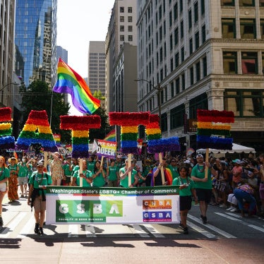 Marchers with the Greater Seattle Business Association, Washington State's LGBTQ+ and allied chamber of commerce, during the annual Seattle Pride Parade, June 25, 2023.