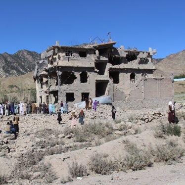 Residents walk through the rubble from Pakistani airstrikes that killed civilians in the village of Mandokhail, Chamkani district, Afghanistan, June 29, 2026.