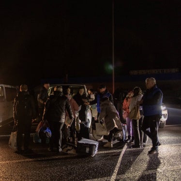 Ukrainian children who returned from Russia and Russian-occupied territories of Ukraine gather with their relatives after crossing the border from Belarus to Ukraine, in the Volyn region, on February 20, 2024.