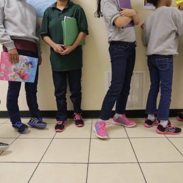 Migrant teens line up for a class in San Benito, Texas, in August 29, 2019.