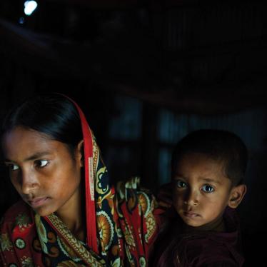 Belkis, 15 years old, holds her one-year-old son in the house where she lives with her mother, two sisters, and one brother. Belkis was married when she was 13 years old to a man who threatened to commit suicide if the family didn’t agree to the marriage.