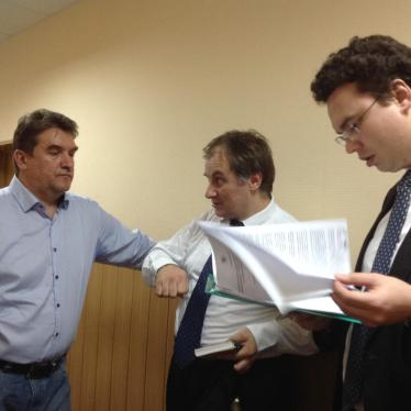 Representatives of Human Rights Center "Memorial" waiting for the court hearing to begin. September 28, 2015, Moscow.