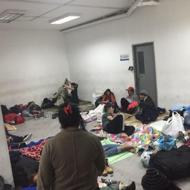 Detained Cubans in a cell at Quito's court offices building, waiting to be deported or released after deportation hearings, July 9, 2016.