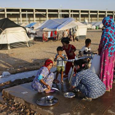 Iraqis who fled from ISIS in Nineveh find shelter at a camp for displaced persons in the Kurdistan Region of Iraq.